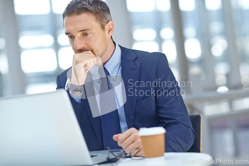 Image of Laptop, finance and male accountant thinking while working on financial report in the office. Success, professional and businessman planning an accounting statistics project on computer in workplace.