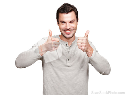 Image of Portrait, thumbs up and emoji with a man in studio isolated on a white background as a winner or for motivation. Thank you, goal and target with an excited man giving a positive hand sign of support