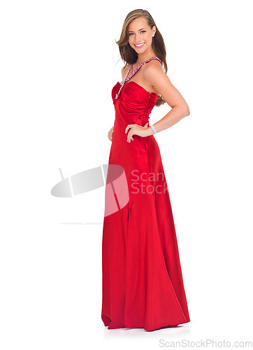 Image of Elegant, prom and portrait of a woman in a red dress for an event isolated on a white background in a studio. Happy, fashion and model in a silk ball gown for a celebration on a studio background