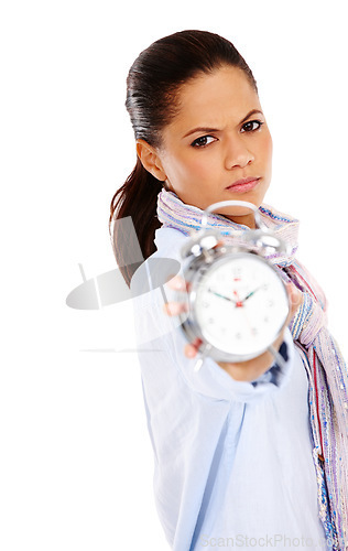 Image of Black woman, serious face and clock for alarm, time management and frustration in white background. African girl, angry and frustrated for alarm clock stressed or disappointed isolated in studio