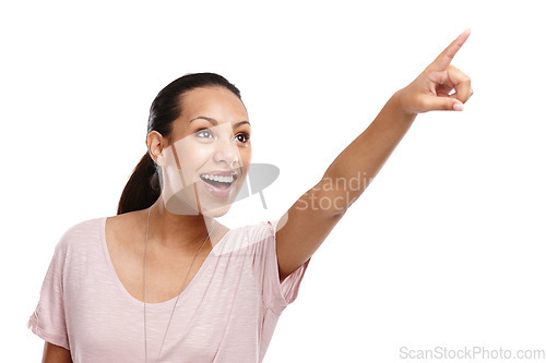 Image of Woman, happy and excited pointing finger in studio for advertising mockup, marketing promo or sales product suggestion. Happy person, point hands and vision motivation isolated in white background