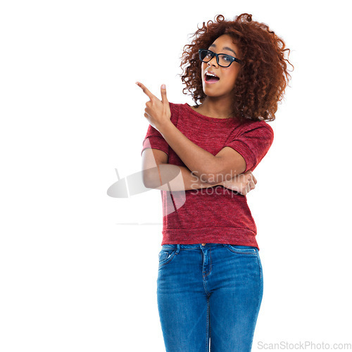 Image of Black woman, pointing finger and studio with wow, beauty or casual clothes by white background. Woman, happy isolated model and hand sign for fashion, jeans and glasses on face for surprise with afro