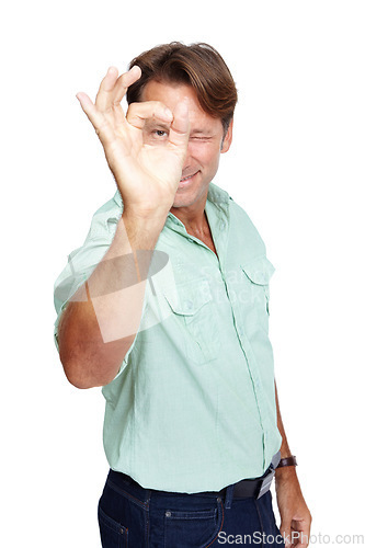 Image of Mature businessman, portrait or okay hand on isolated white background for precision, growth target or motivation goals. Smile, happy worker and ok gesture, yes or winner fingers for bullseye mock up