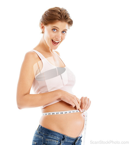 Image of Portrait of happy pregnant woman with measuring tape on stomach, excited smile on face and white background. Health, wellness and pregnancy, woman measuring growth progress of baby in belly in studio