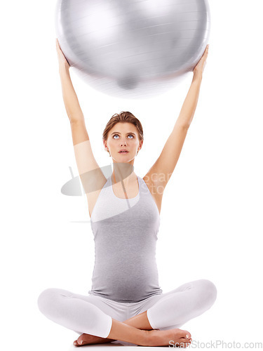 Image of Pregnant woman, lotus and exercise ball with white background for fitness, pilates and wellness. Pregnancy, medicine ball and workout in studio for healthy maternity, yoga training and body energy