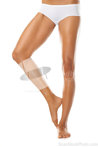 Image of Woman, skincare and legs for beauty, white background and isolated studio. Closeup, cosmetics model and leg hair removal, epilation and body wellness from laser salon, aesthetic glow or botox results