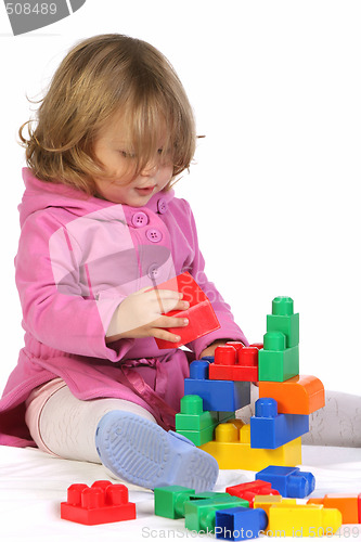 Image of girl with colorful blocks 