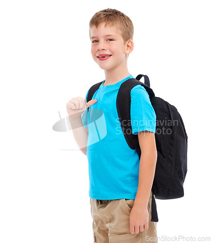 Image of Backpack, happy and boy child in a studio with a casual, cool and natural outfit for back to school. Happiness, smile and portrait of a kid with a bag and stylish clothes isolated by white background
