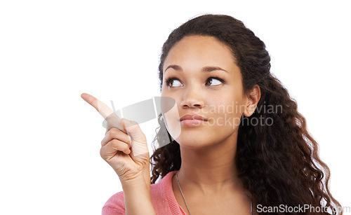 Image of Young black girl, point and thinking suggestion for advertising mockup, marketing and branding in white background. Person, happy face and pointing, happiness and product placement space in studio