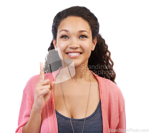 Image of Beauty, white background and woman pointing finger for advertising, marketing and copy space in studio. Smile, branding and beautiful girl with hand gesture for announcement, sale and product deal