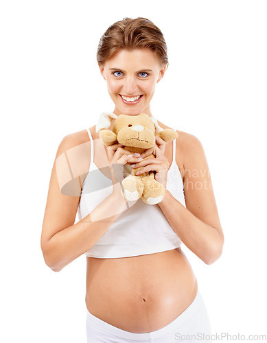 Image of Pregnancy portrait, woman and teddy bear of a mother happy about pregnant stomach and baby toy. Excited, love and mama smile with children doll ready for motherhood, family and loving parent care