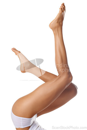 Image of Skincare, wellness and legs of woman on a white background for shaving, grooming and waxing. Cleaning, beauty and pedicure of girl isolated in studio for laser treatment, cosmetics and hair removal