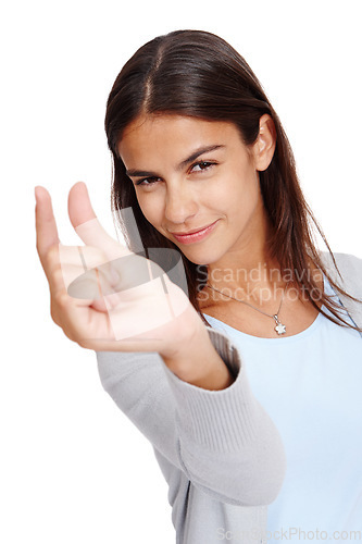 Image of Woman, portrait and hand for advertising size, space and small mockup with a smile in studio. Female model in studio showing fingers or sign for scale, inch or symbol isolated on a white background