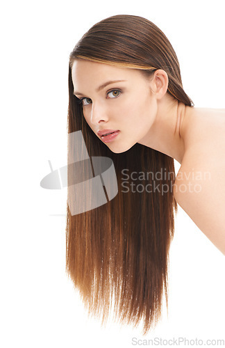 Image of Portrait, hair and beauty with a model woman in studio on a white background with a straight hairstyle. Salon, haircare and growth with an attractive young female posing to promote keratin treatment