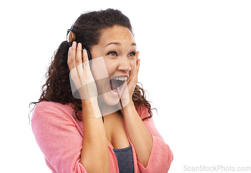 Image of Woman, wow face and excited for music, headphones and studio background. Happy, crazy and surprise girl listening to audio, podcast and radio of amazing entertainment announcement on white background