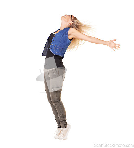 Image of Freedom, carefree and a woman model standing arms outstretched in studio on a white background feeling free. Motivation, wellness and peace with a young female posing for stress free liberation