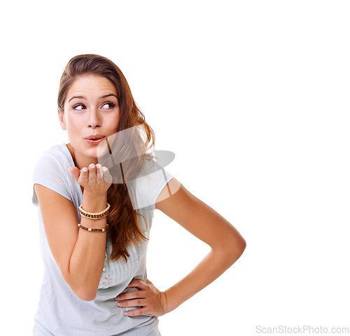 Image of Blowing kiss, happy and woman thinking of mockup space for motivation, marketing and care. Happiness, friendly and model with love, flirty body language and fun on a white background in studio