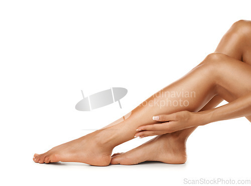 Image of Beauty, hand and legs with woman in studio for wellness, grooming and self care on white background. Skincare, leg and girl touching soft, smooth and luxury skin after hygiene treatment with mockup