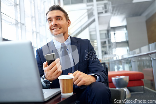 Image of Businessman, smartphone and laptop in corporate lounge, thinking and digital marketing. Startup, male entrepreneur and ceo with cellphone, social media and planning for advertising and modern office