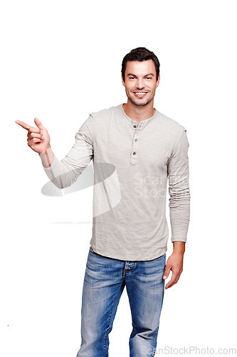 Image of Man, studio and portrait while pointing finger at space for advertising isolated on a white background. Happy male model from France with hand sign for promotion, announcement and brand product