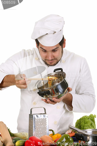 Image of young chef preparing lunch 