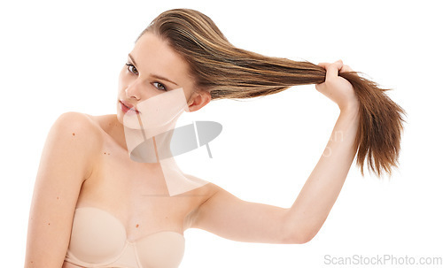 Image of Natural beauty, portrait and woman with hair care, shine and grooming routine isolated on white studio background. Female, girl pulling hair and luxury treatment for healthy scalp, salon and wellness