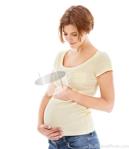 Image of Woman, pregnant and studio with hands on stomach with smile, thinking and love by white background. Pregnant woman, future mother and belly with care, vision and wellness while isolated in pregnancy