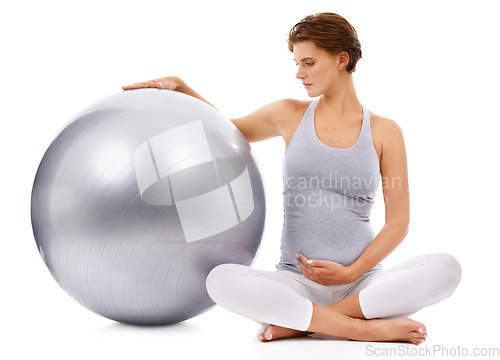 Image of Pregnant, woman and fitness ball with white background for exercise, pilates and wellness. Pregnancy, medicine ball and mother workout on studio background for healthy body, yoga training and energy