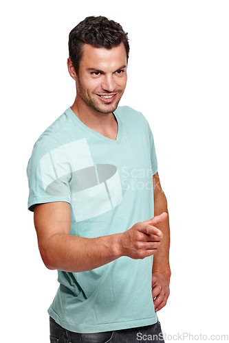Image of Handsome man, smile and pointing finger while standing against a white studio background. Isolated attractive happy male model posing and smiling while showing direction on a white background