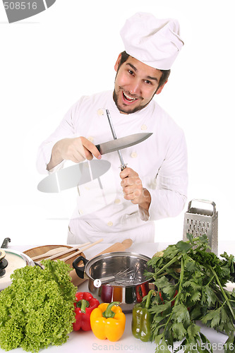 Image of chef sharpening a knife 