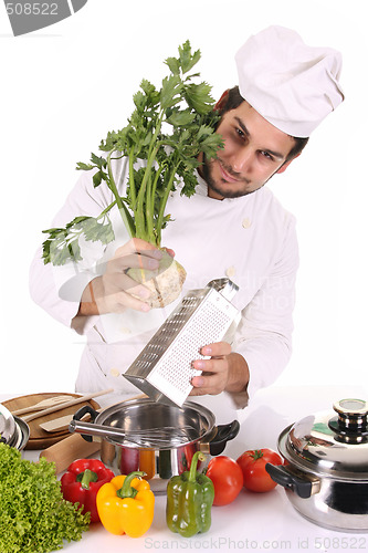 Image of young chef preparing lunch