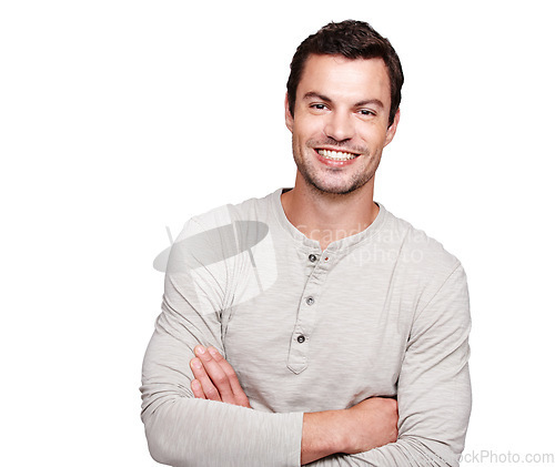 Image of Man, smile and arms crossed with teeth and vision for happy ambition, goals or profile against white studio background. Portrait of a isolated young male smiling with crossed arms on white background