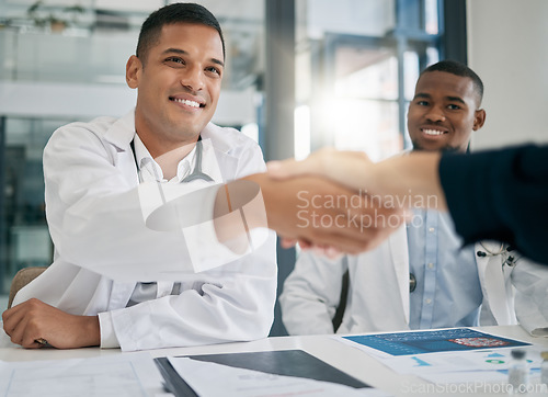 Image of Doctor, handshake and meeting with patient, smile and greeting for vaccination education, talk or help. Black man, doctors and shaking hands with client for wellness, healthcare or medicine in clinic