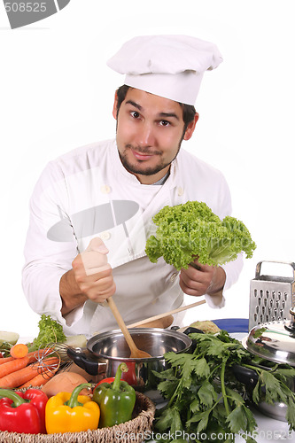 Image of young chef preparing lunch