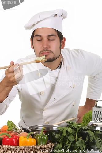 Image of young chef smelling