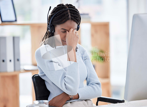 Image of Black woman, stress or headache on call center computer in telemarketing company, b2b sales business or contact us startup. Receptionist, customer support or consultant anxiety on technology burnout