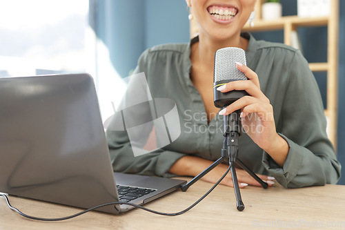 Image of Laptop, podcast microphone and black woman live streaming business tips in home office. Influencer, broadcast and hand of female podcaster, radio host or presenter recording audio for social media.