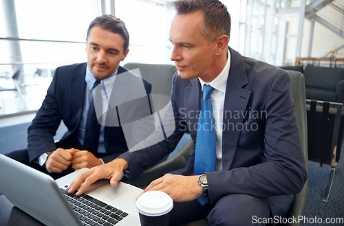 Image of Planning, laptop and business people or partner in lobby meeting for digital, website or online financial strategy. Corporate businessman with manager in finance management, stock market or budget