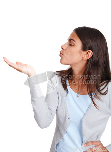 Image of Hand, kiss and marketing with a business woman in studio isolated on a white background for advertising. Product, brand and logo with an attractive young female holding blank space for branding