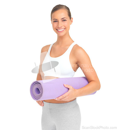 Image of Woman, studio portrait and holding yoga mat with smile, happiness and white background for exercise. Isolated model, yoga or pilates training with mindfulness, health and fitness for strong body