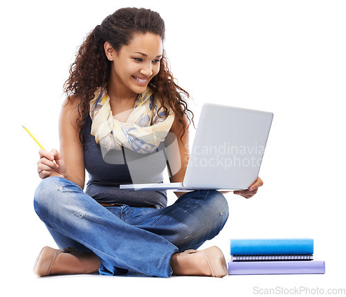 Image of Student, laptop and smile learning with books or studying in studio for university education, knowledge and internet research. Young black woman, planning or reading college notes on tech device