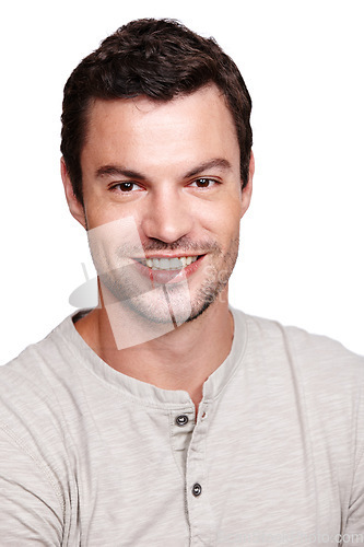 Image of Portrait, face and happy with a man model in studio isolated on a white background for product placement. Marketing, advertising or fashion with a handsome young male posing to promote on blank space