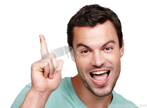 Image of Portrait, excited and mockup with a man in studio isolated on a white background for marketing or advertising. Face, pointing and mock up with a happy male posing on blank product placement space