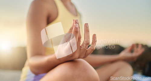 Image of Yoga, hands or woman in meditation at sunrise in nature for calm relaxing peace, wellness or mindfulness. Chakra, gratitude or healthy spiritual girl in zen lotus pose breathing to meditate or focus