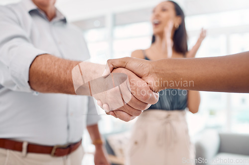 Image of Handshake, partnership and b2b with a business man shaking hands with a colleague in the office for promotion. Teamwork, collaboration and meeting with a male employee and coworker in agreement