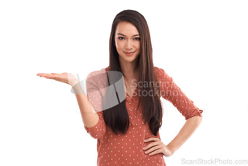 Image of Portrait, mockup and space with a woman in studio isolated on a white background holding blank space. Marketing, mock up and product placement with a female advertising to promote a brand logo
