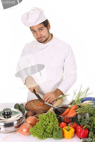 Image of young chef preparing lunch 