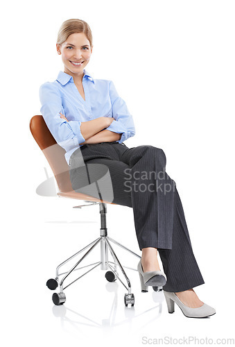Image of Portrait, arms crossed and business woman on chair in studio on white background. Ceo, boss and smile of happy, confident or proud female entrepreneur from Canada sitting on seat with success mindset