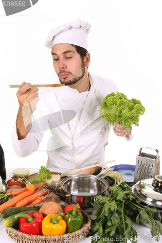 Image of young chef preparing lunch 
