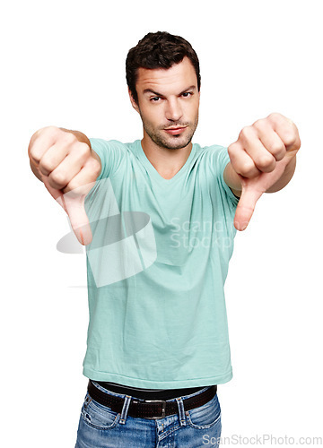 Image of Thumbs down, man and studio portrait, white background and isolated for wrong sign, poor review or body language. Disappointed guy, hands and bad opinion, rejection emoji and hate feedback of failure